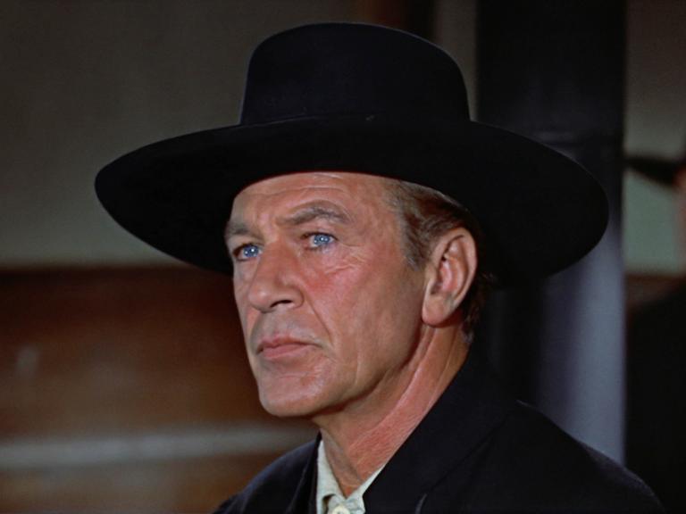 Gary Cooper mit schwarzem Hut und strengem Blick