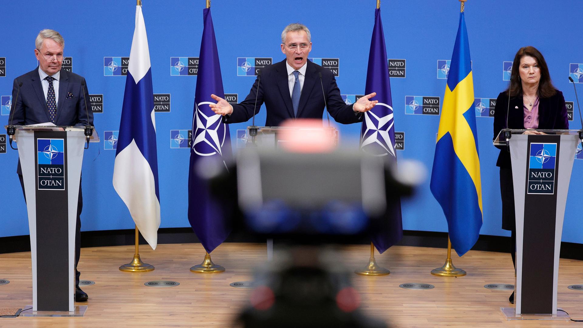 FILE - NATO Secretary General Jens Stoltenberg, center, participates in a media conference with Finland's Foreign Minister Pekka Haavisto, left, and Sweden's Foreign Minister Ann Linde, right, at NATO headquarters in Brussels, Jan. 24, 2022. Security concerns over Russiaâs ongoing invasion of Ukraine changed the calculus for Finland and Sweden which have long espoused neutrality and caused other traditionally âneutralâ countries to re-think what that term really means for them. (AP Photo/Olivier Matthys, File)