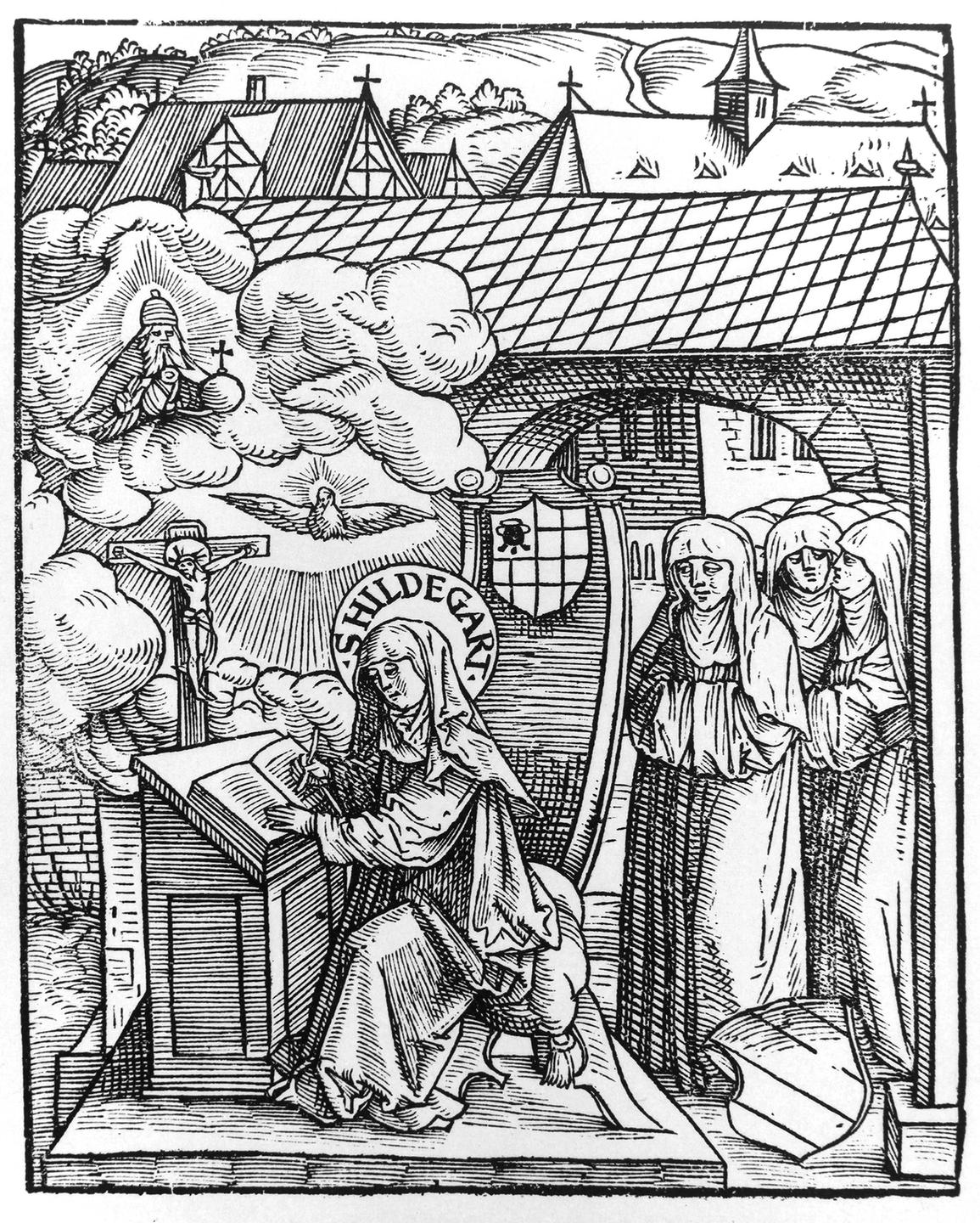 Holzschnitt von Hildegard von Bingen. Eine Nonne sitzt an einem Tisch und schreibt und wird dabei von anderen Nonnen beobachtet. 