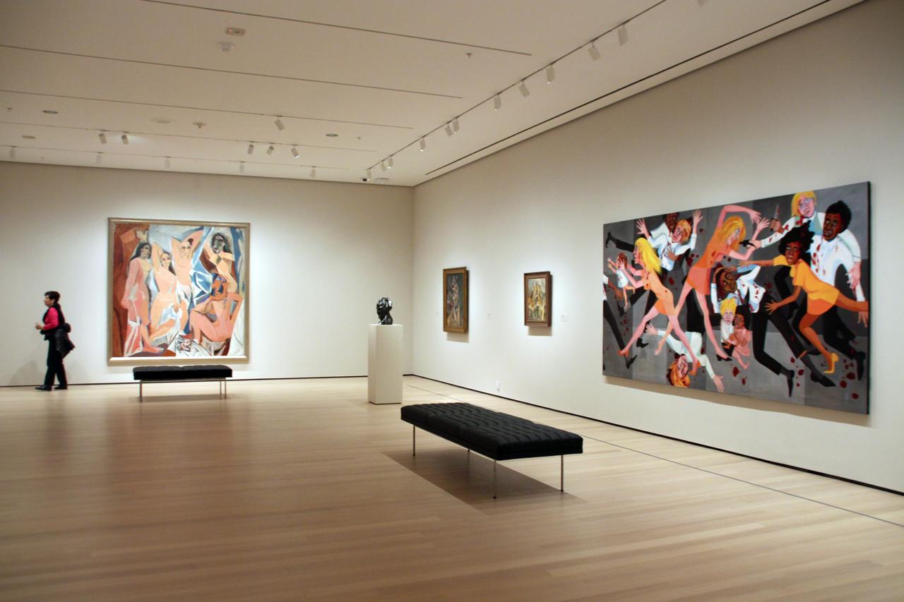 Die Gemälde "Les Demoiselles d'Avignon" von Pablo Picasso (l) und "American People Series #20: Die" von Faith Ringgold hängen in einem Raum im Museum of Modern Art in New York.