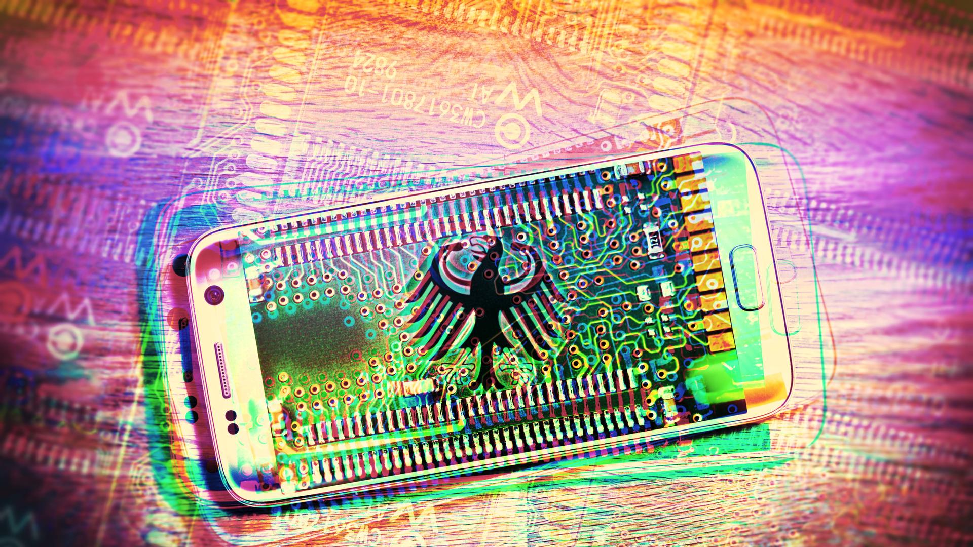Ein Handy mit Bundesadler