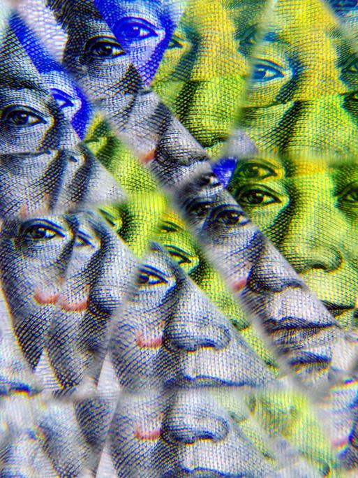 Teile chinesischer Banknoten mit dem Konterfeit von Mao werden verfremdet in einem Kaleidoskop-Muster dargestellt Teile chinesischer Banknoten mit dem Konterfeit von Mao werden verfremdet in einem Kaleidoskop-Muster dargestellt