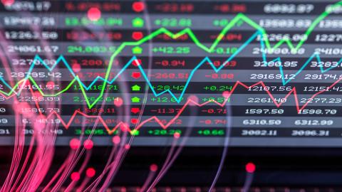 Eine Computergrafik mit bunten Börsencharts. 