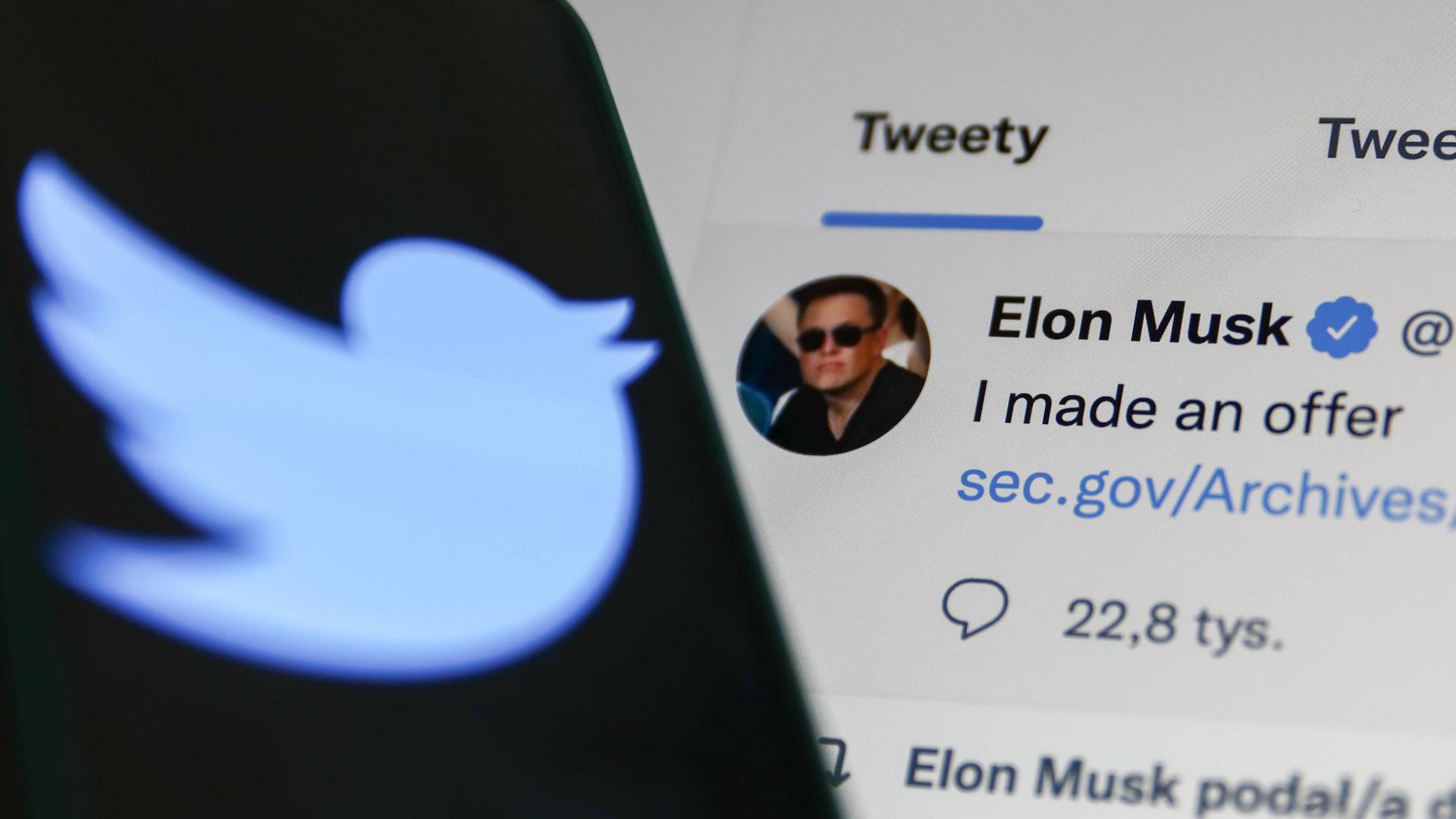 Elon Musk Offers To Buy Twitter Elon Musk s Tweet displayed on a screen and Twitter logo displayed on a phone screen are Elon Musk Offers To Buy Twitter Elon Musk s Tweet displayed on a screen and Twitter logo displayed on a phone screen are