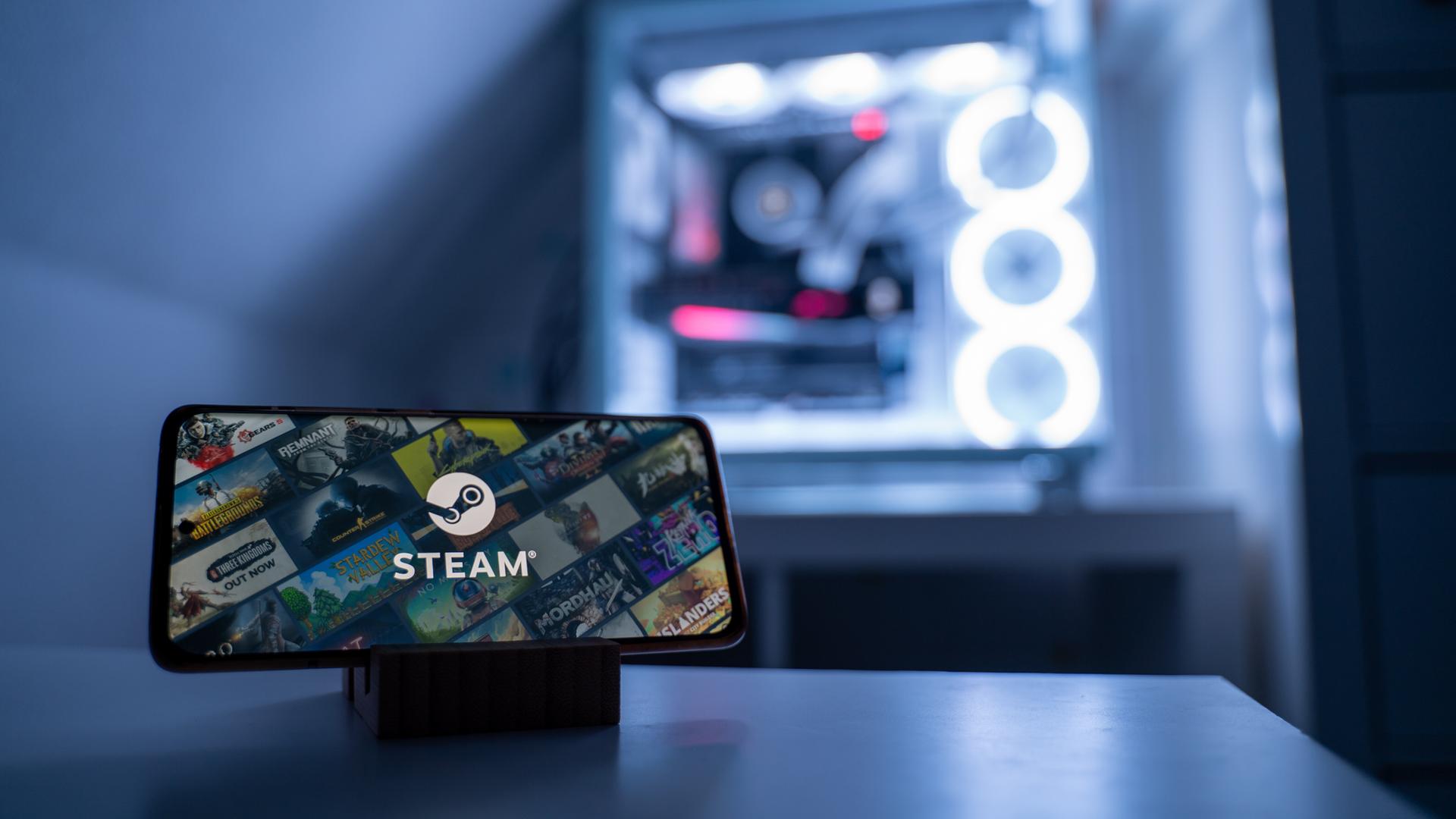 Auf einem Smartphone-Display ist das Logo der Gaming-Plattform Steam zu sehen. Auf einem Smartphone-Display ist das Logo der Gaming-Plattform Steam zu sehen.