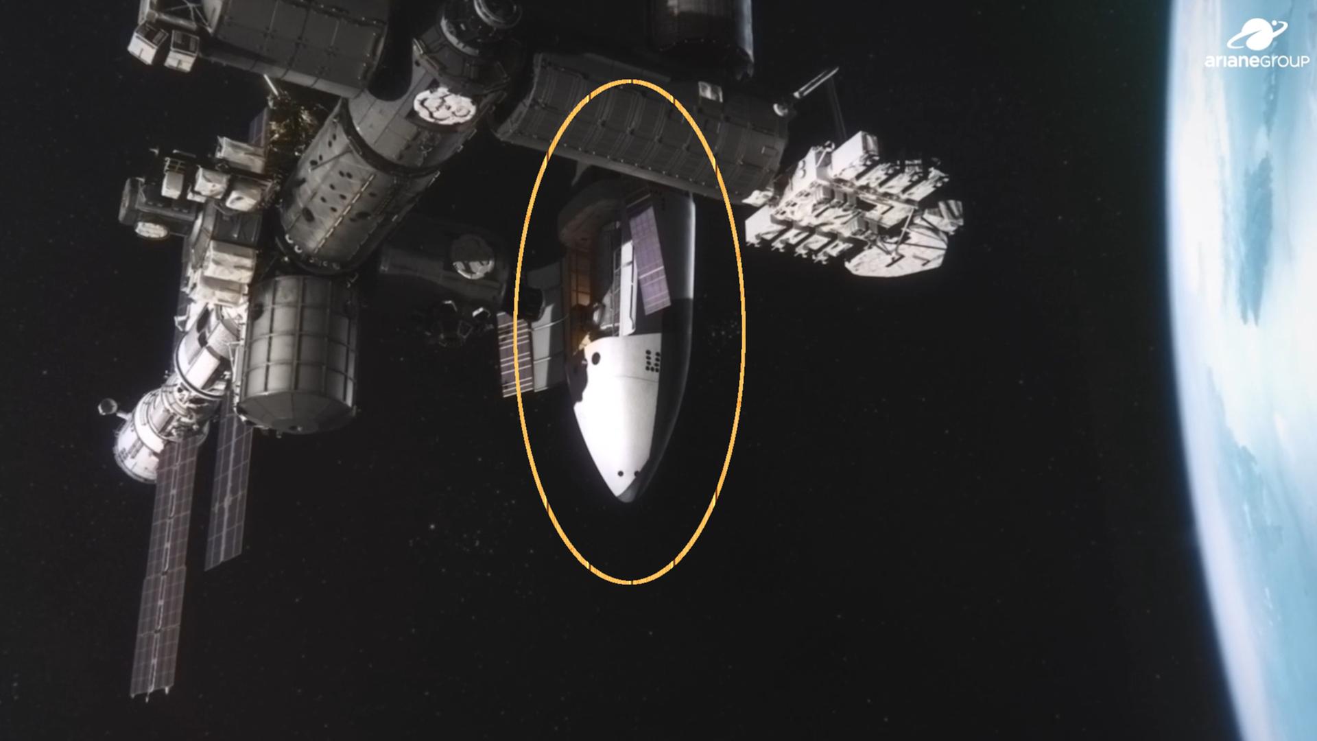 Eine Illustration zeigt, wie das Raumschiff SUSIE an die Internationale Raumstation angedockt ist.