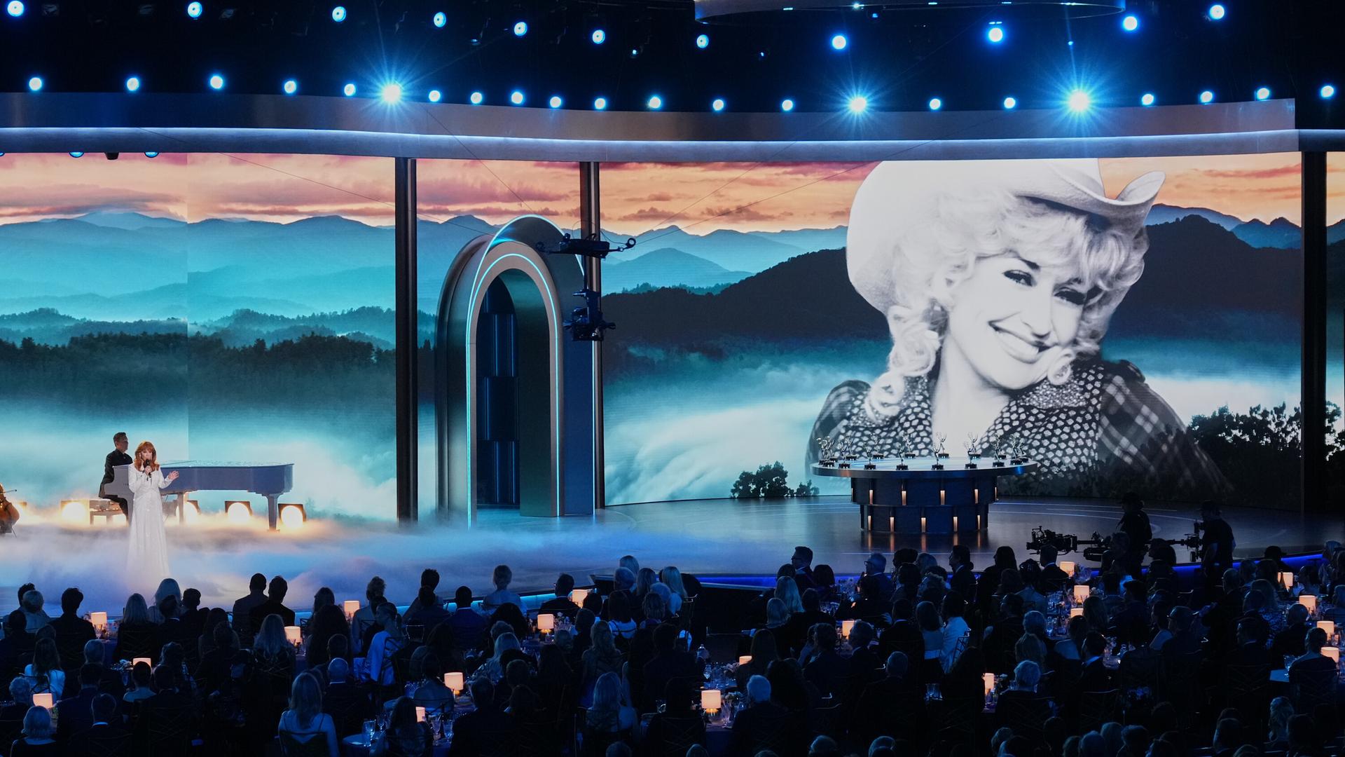 Reba McEntire performs "Appalachian Memories" in tribute to Dolly Parton during the 78th Emmy Awards on Monday, Sept. 14, 2026, at the Peacock Theater in Los Angeles. (AP Photo/Chris Pizzello)