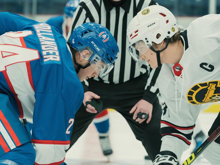 This image released by Crave shows Hudson Williams, left, and Connor Storrie in a scene from "Heated Rivalry." (Crave via AP)