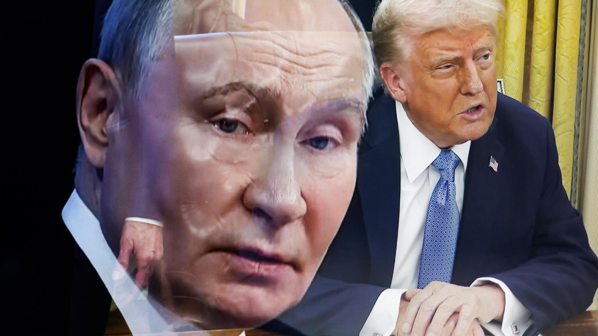 Russlands Präsident Wladimir Putin (l.) und US-Präsident Donald Trump (r.)