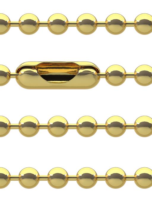 Übereinanderliegende Goldketten werden von kleinen Punkten durchbrochen.
