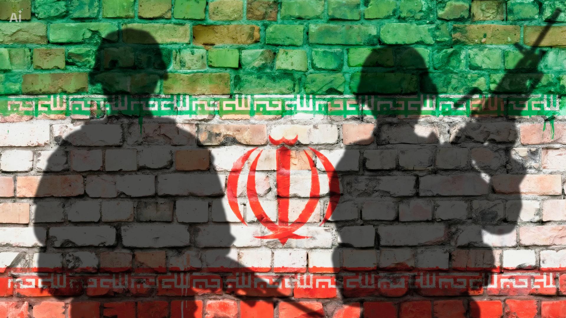 Schattenbilder von zwei Soldaten vor Ziegelwand mit Iran-Flagge 