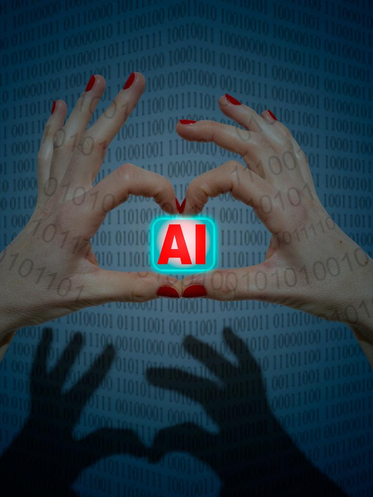 Zwei Hände mit rot lackierten Finger bilden eine Herzform in der sie ein Symbol mit dem Schriftzug AI (Artificial Intelligence) halten.