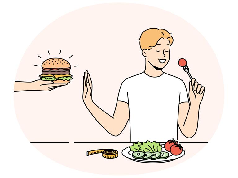 Die Grafik zeigt einen Mann an einem Tisch, der einen Burger ablehnt und stattdessen gesundes Essen verzehrt. Die Grafik zeigt einen Mann an einem Tisch, der einen Burger ablehnt und stattdessen gesundes Essen verzehrt.