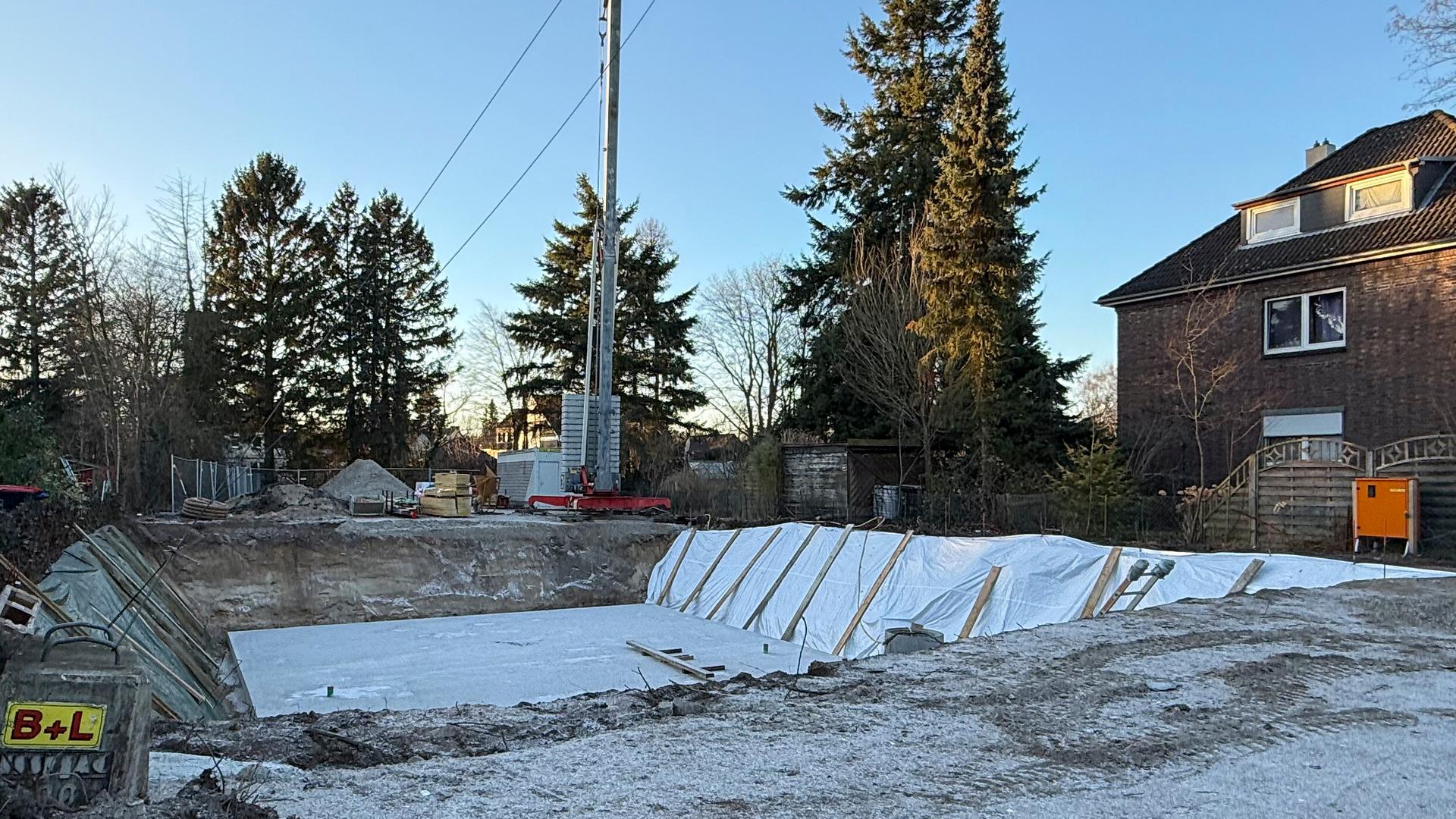 Der Betonboden eines Neubaus für ein Einfamilienhaus Der Betonboden eines Neubaus für ein Einfamilienhaus