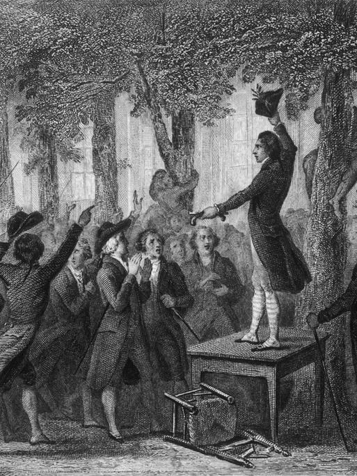 Französische Revolution 1789. In den Gärten des Palais Royal steigt Camille Desmoulins auf einen Tisch und spricht zu den Massen.