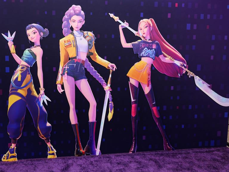 Drei gezeichnet K-Pop-Stars aus dem Film "KPop Demon Hunters"