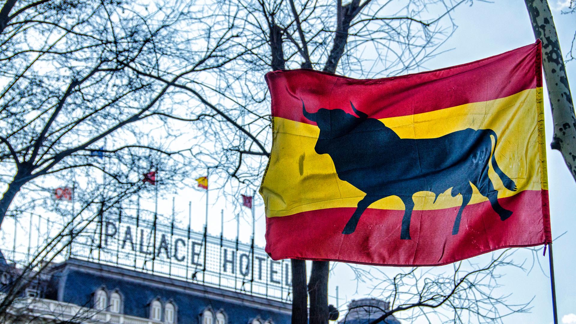 Spanish Flag, behind the facade of the palace hotel Madrid Spain Copyright: xJimmyxVillaltax JVI-0092
