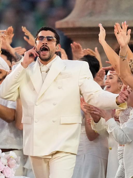 Bad Bunny performs during halftime of the NFL Super Bowl 60 football game between the New England Patriots and the Seattle Seahawks, Sunday, Feb. 8, 2026, in Santa Clara, Calif. (AP Photo/Julio Cortez)