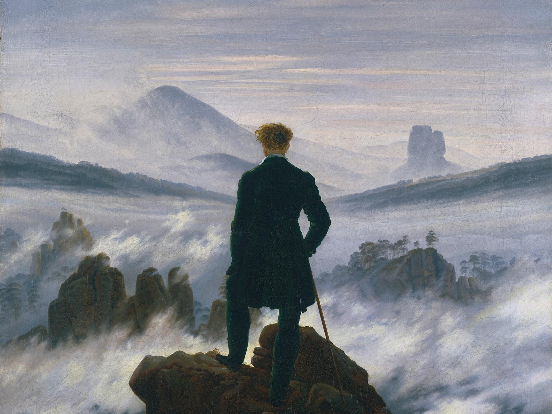 Caspar David Friedrichs Gemälde "Wanderer über dem Nebelmeer" zeigt in der Bildmitte einen Mann in Rückenansicht der auf dem Gipfel eines Berges steht (Â© Fine Art Images/Heritage Images)