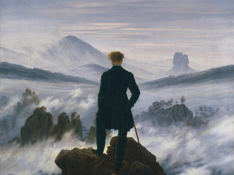 Caspar David Friedrichs Gemälde "Wanderer über dem Nebelmeer" zeigt in der Bildmitte einen Mann in Rückenansicht der auf dem Gipfel eines Berges steht (Â© Fine Art Images/Heritage Images)