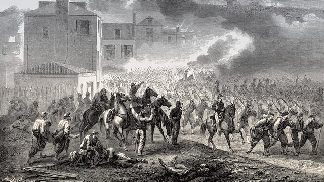 Auf einer Zeichnung abgebildet ist eine Szene der zweiten Schlacht von Corinth, einer Schlacht im amerikanischen Bürgerkrieg. Zu sehen sind Soldaten zu Fuß und hoch zu Roß.