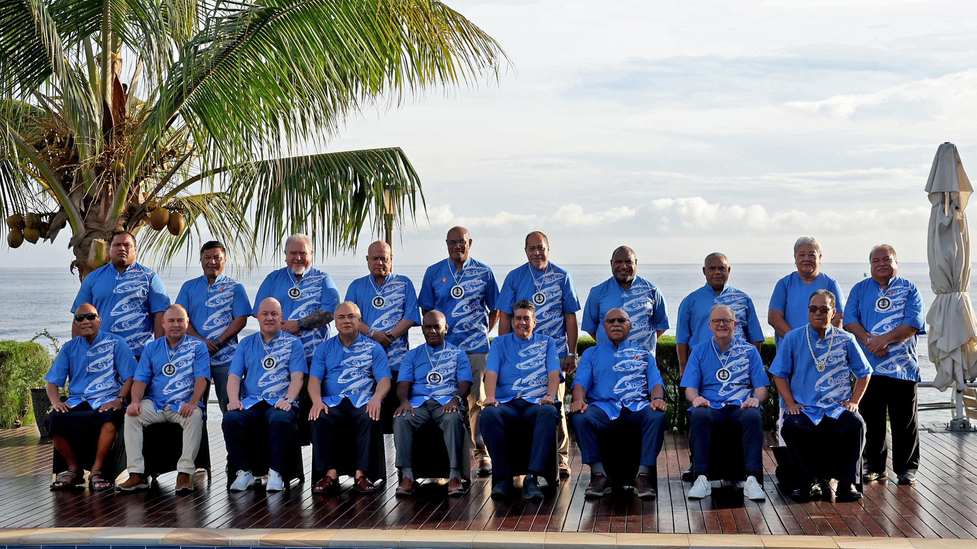 Leaders of Pacific Islands nations pose for the family photo at the Pacific Islands Forum summit in Honiara, the capital of the Solomon Islands, on September 11, 2025. Pacific Islands leaders opened an influential summit in the Solomons on September 10, with nations split over China's growing role in the region and alleged meddling in the meeting. (Photo by BEN STRANG / AFP)