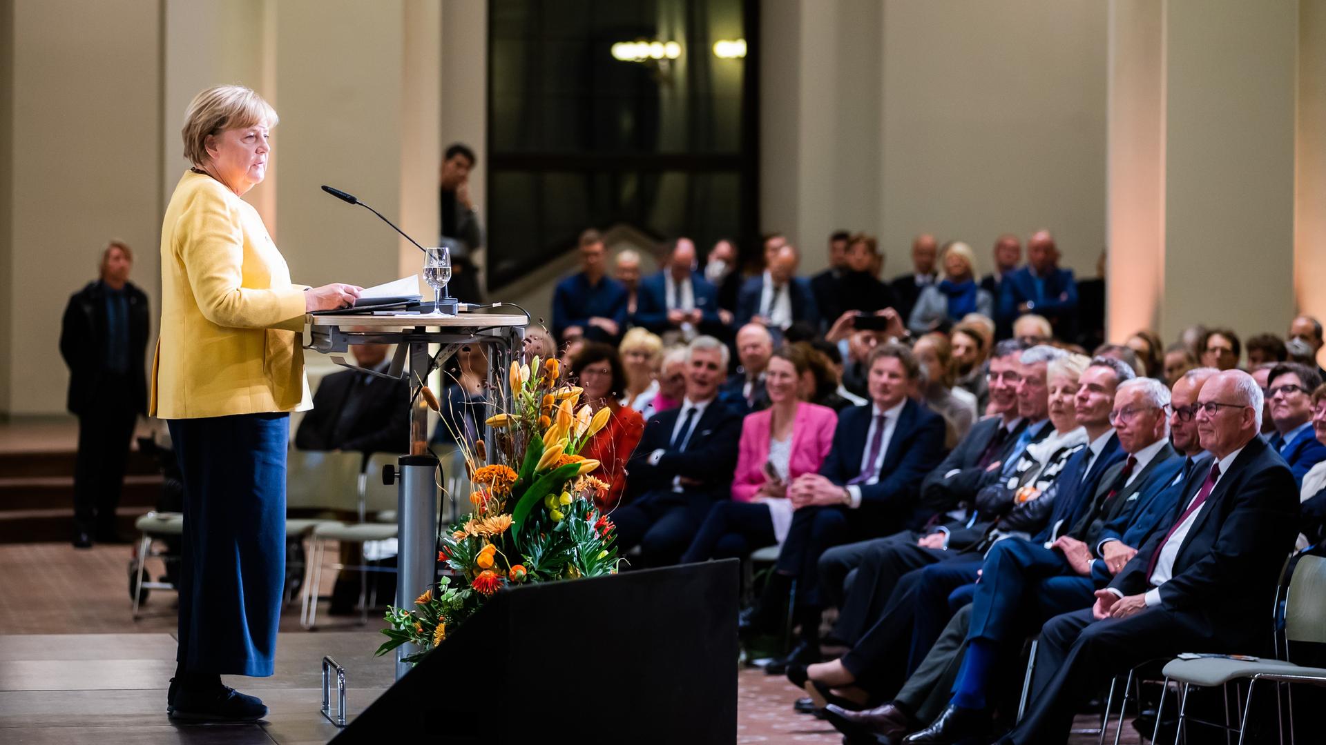 Angela Merkel (CDU), ehemalige Bundeskanzlerin, spricht bei der Eröffnungsveranstaltung der Bundeskanzler-Helmut-Kohl-Stiftung in der Friedrichstadtkirche am Gendarmenmarkt