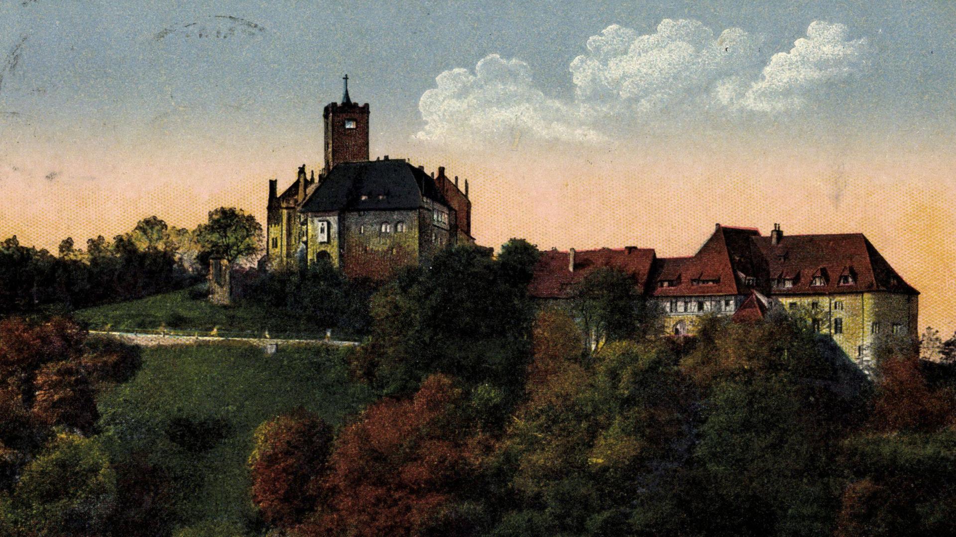Blick auf die Wartburg bei Eisenach in Thüringen auf einer historischen, nachkolorierten Postkarte.