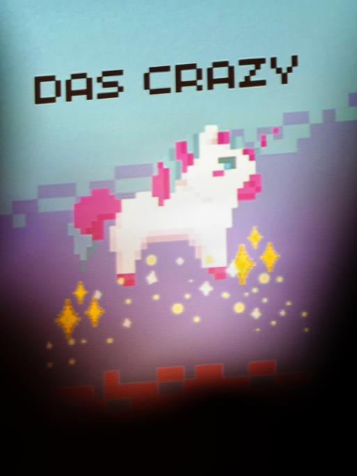 Das Jugendwort für das Jahr 2025, «Das crazy» wird auf einer Leinwand angezeigt. 