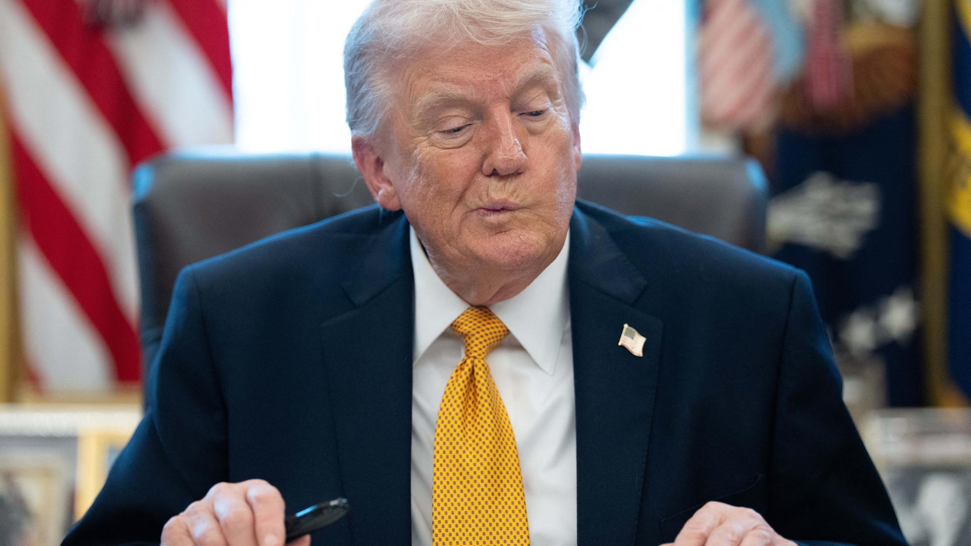 President Donald Trump zieht eine Grimasse