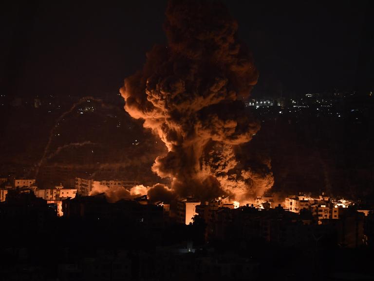 BEIRUT, LEBANON - OCTOBER 6: Smoke and flames rise among the residential buildings following an Israeli attack on Dahieh region in Beirut, Lebanon on October 6, 2024. Houssam Shbaro / Anadolu