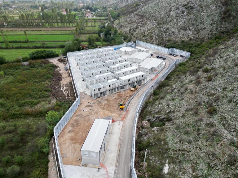 This aerial photo shows the site of a recently build Italian-run migrant centre at the port of Shengjin, some 60 kms northwest of Tirana, on October 11, 2024.