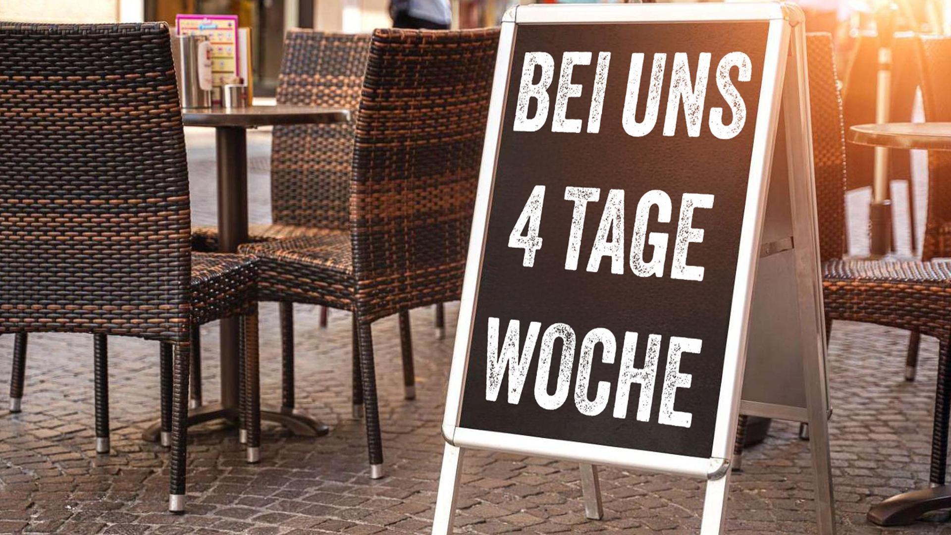"Bei uns 4-Tage-Woche", steht auf einem Schild vor einem Restaurant (Symbolbild). "Bei uns 4-Tage-Woche", steht auf einem Schild vor einem Restaurant (Symbolbild).