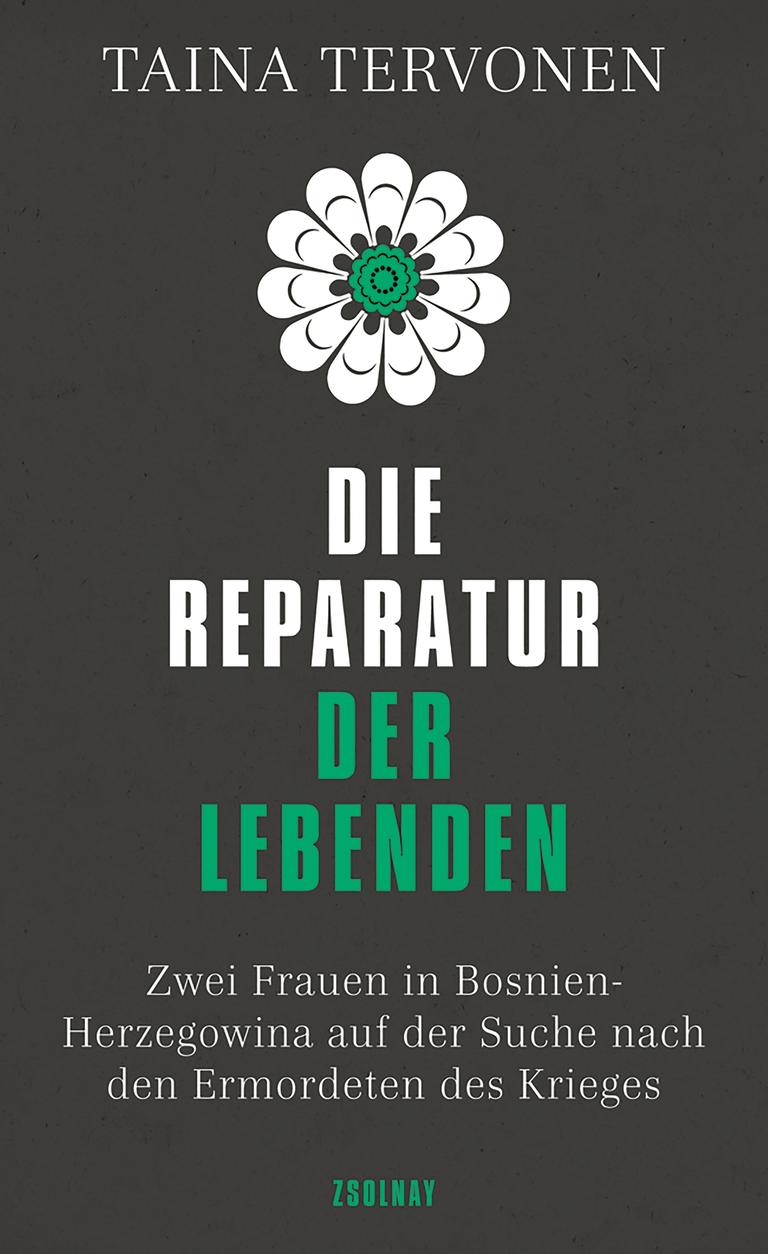 Das Foto zeigt das Cover des Buchs „Die Reparatur der Lebenden“ von Taina Tervonen. Es ist in verschiedenen Grün- und Weißtönen gehalten. Oberhalb des Titels ist eine weiße Blumenblüte zu sehen. Das Foto zeigt das Cover des Buchs „Die Reparatur der Lebenden“ von Taina Tervonen. Es ist in verschiedenen Grün- und Weißtönen gehalten. Oberhalb des Titels ist eine weiße Blumenblüte zu sehen.