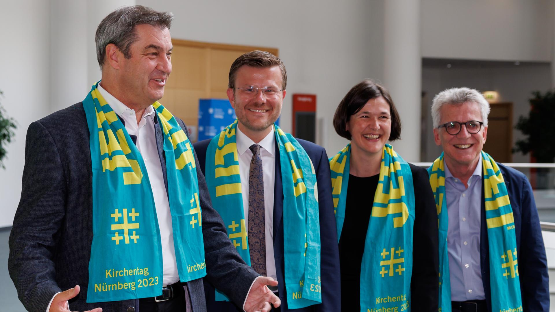 Markus Söder (l-r, CSU), Ministerpräsident von Bayern, Marcus König (CSU), Nürnberger Oberbürgermeister, Kristin Jahn, Generalsekretärin des Deutschen Evangelischen Kirchentags, und Thomas de Maizière, Präsident des Deutschen Evangelischen Kirchentags, beim 38. Deutschen Evangelischen Kirchentag 2023 in Nürnberg. Markus Söder (l-r, CSU), Ministerpräsident von Bayern, Marcus König (CSU), Nürnberger Oberbürgermeister, Kristin Jahn, Generalsekretärin des Deutschen Evangelischen Kirchentags, und Thomas de Maizière, Präsident des Deutschen Evangelischen Kirchentags, beim 38. Deutschen Evangelischen Kirchentag 2023 in Nürnberg.